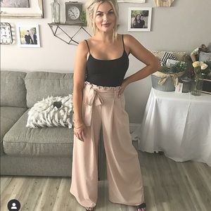 Adorable mauve pants with bow accent!